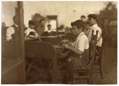 One of the smallest apprentices I found. (Work being slack.) De Pedro Casellas Cigar Factory, Tampa, Fla. Jan. 28, 1909. LOC nclc.04513
