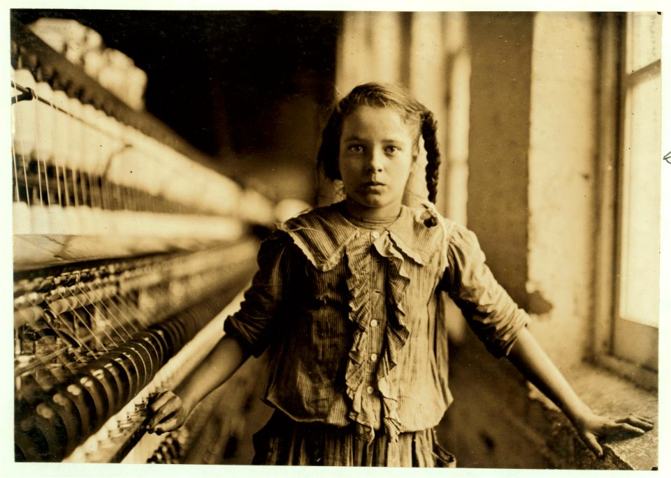 One of the spinners in Whitnel Cotton Mfg. Co. N.C. She was 51 inches high. Had been in mill 1 year. Some at night. Runs 4 sides, 48 cents a day. When asked how old, she hesitated, then said LOC cph.3a49704