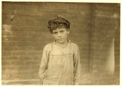 One of the young doffers working in Pell City Cotton Mill. Superintendent of mill is also Mayor of Pell City. LOC cph.3b21323
