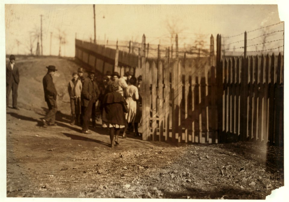 One of the young workers in Indian Head Mills. Going to work at noon-hour. LOC nclc.01959