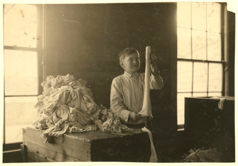 One of the youngest turners at work in the Crescent Hosiery Mill. LOC nclc.02967