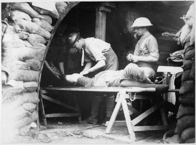 On the British Western Front during Battle of Menin Road. Scottish territorials being examined in a dressing station.... - NARA - 533669