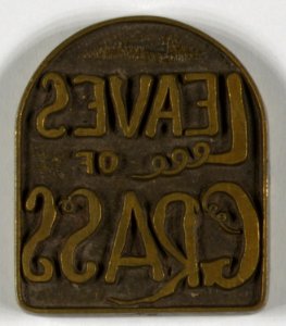Original brass dies used for 1860 edition of leaves of grass. Leaves of grass (on tombstone-shaped brass plate) LCCN2005680546