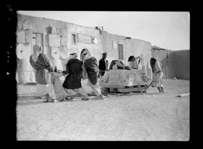 Palmyra. Workmen moving massive capital LOC matpc.15510