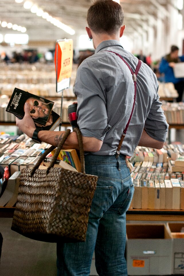 Man man buying man reading photo