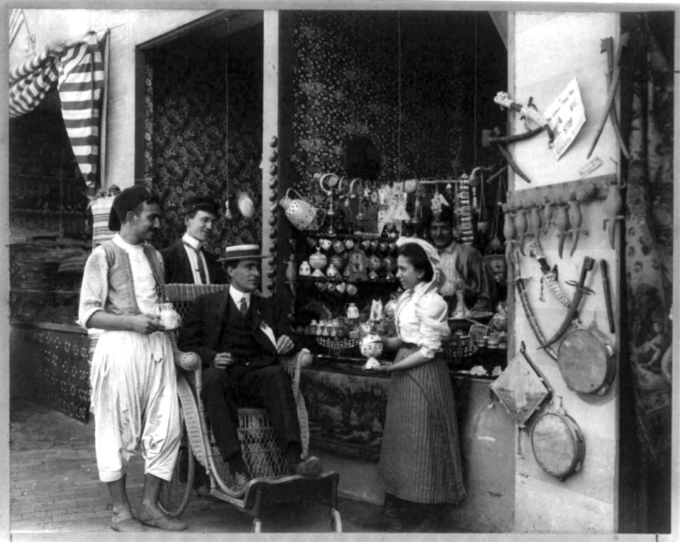 Pan-American Exposition, Buffalo, N.Y., 1901- Man in wheeled chair at souvenir shop with 4 other persons LCCN2002707103