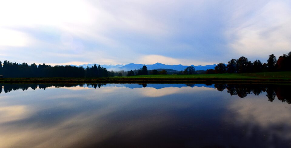 Clouds alpine mirroring photo