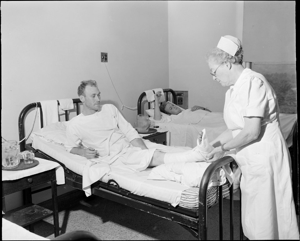 Paris Duty who works for the Pocahontas Corporation at the Amonate Mine, received a broken leg in mine coal car... - NARA - 541091
