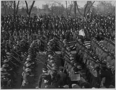 Parade in honor of returned fighters. Passing the reviewing stand. In the stand are, Governor Al . . . - NARA - 533509