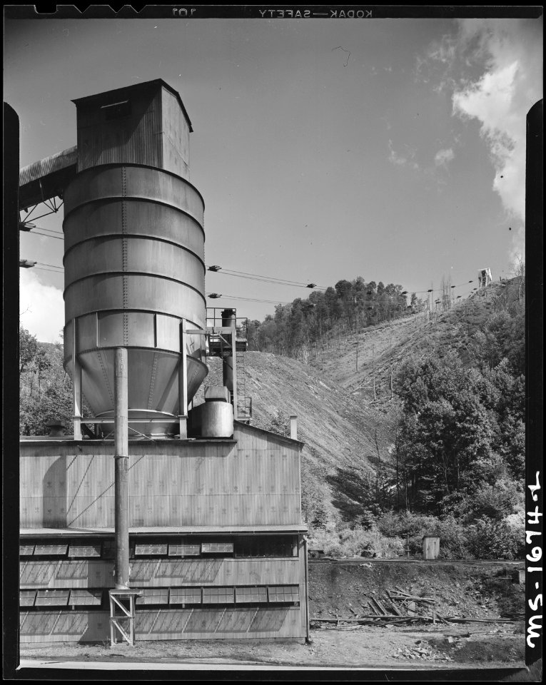 Part of coal cleaning and sizing plant, and traveling buckets which carry slate for disposal at upper right on top of... - NARA - 540903
