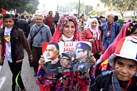 Participant holding picture of Abdel Fateh el Sissi
