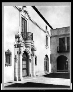 Pasadena, California, Mrs. Herbert Coppell home - detail of ornate doorway and balcony above - photo by Frances Benjamin Johnston. LCCN2002722361