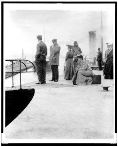 Passengers waiting to board a freighter at the locks at Sault Sainte Marie, Michigan LCCN93517239
