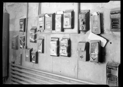 Paterson, New Jersey - Textiles. Numerous mail boxes indicate numerous tenants in the mill building, 185 Sixth Avenue. - NARA - 518779