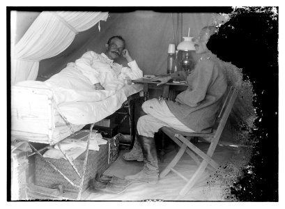 Patient on tent cot LOC matpc.08163