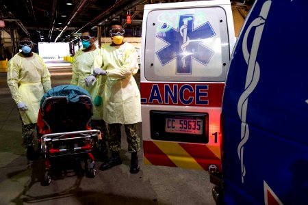 Patient Transport Team Receives Patients Arriving for Medical Care Aboard the Military Sealift Command hospital ship USNS Comfort (T-AH 20) (49757663473)
