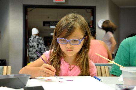 Patients, survivors and family members participate in Oncology on Canvas 130419-N-PJ759-006