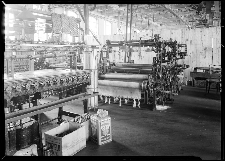 Paterson, New Jersey - Textiles. Idle quilling machines and looms in a cockroach shop. - NARA - 518568