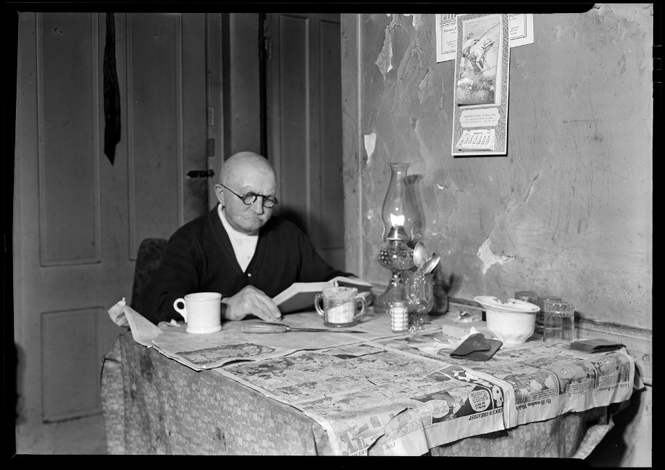 Paterson, New Jersey - Textiles. Living room and 78 year-old silk worker (now retired on $18 a month pension). Lives... - NARA - 518616
