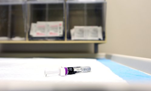 Patients receive flu vaccination at Naval Health Clinic Hawaii 151001-N-GI544-060
