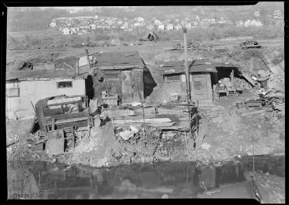 Paterson, New Jersey - Textiles. Bachelor shacks in outskirts of Paterson, on Molly Jan Brook. About 20 men live... - NARA - 518622