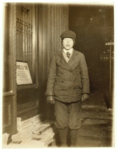 Paul Cory, 14 years old. Photo taken at 10 P.M. said he sometimes sold until midnight. LOC nclc.03396 photo