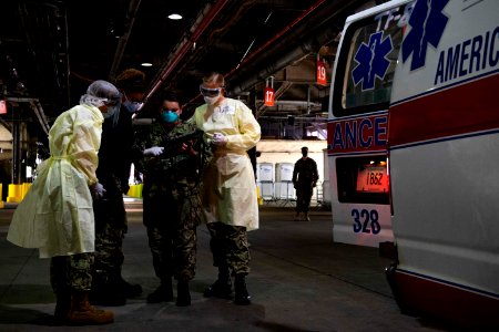 Patient Transport Team Receives Patients Arriving for Medical Care Aboard the Military Sealift Command hospital ship USNS Comfort (T-AH 20) (49758191116)