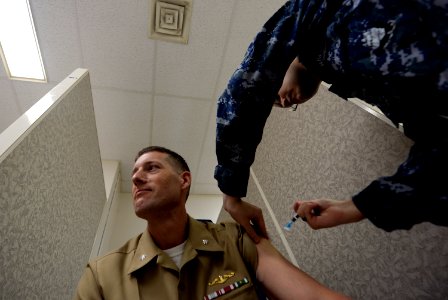 Patients receive flu vaccination at Naval Health Clinic Hawaii 151001-N-GI544-042 photo