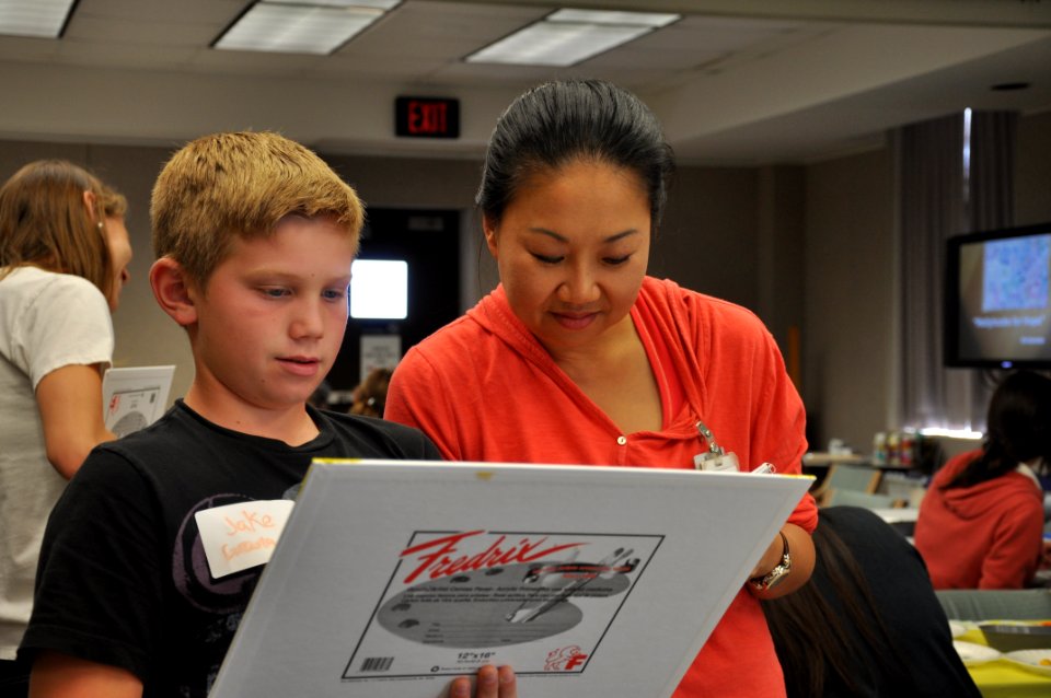 Patients, survivors and family members participate in Oncology on Canvas 130419-N-PJ759-001