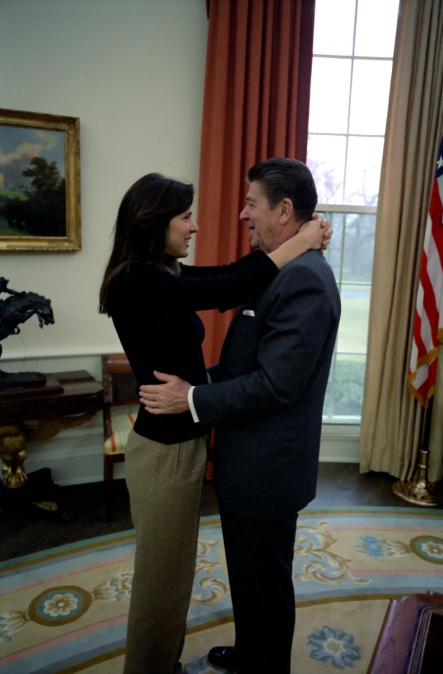 Patti Davis visits her father President Ronald Reagan in the Oval Office