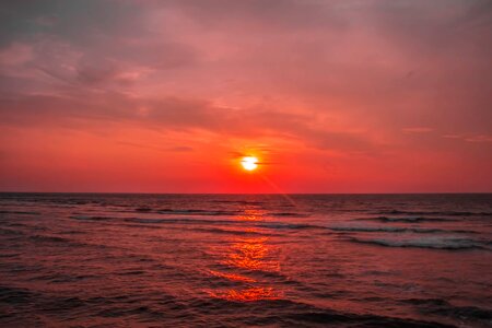 The natural scenery sunset the sea photo