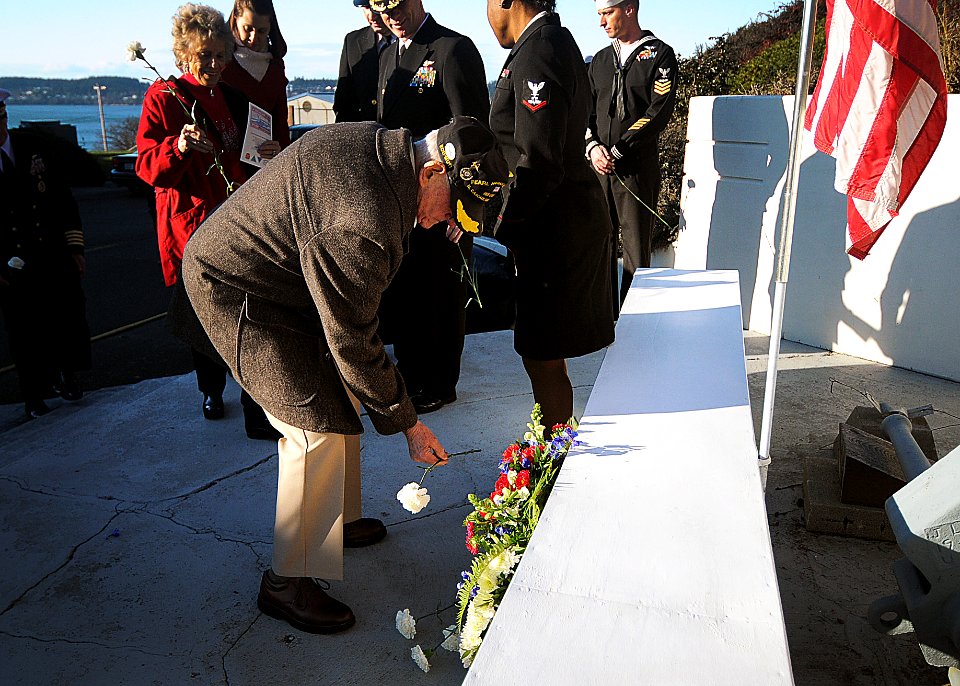 Pearl Harbor lays carnation at USS Arizona memorial 131206-N-DX364-203