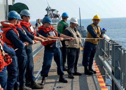 Peleliu conducting a replenishment at sea 140909-N-SU278-103