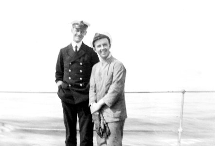 Paymaster W. R. Roe and Engineer Lieutenant S. Hocken posing for the camera on HMS 'Aurora (1913). RMG N22840