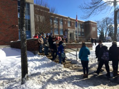 People entering and exiting a polling station in Ward 1, Manchester, New Hampshire, Feb. 9, 2016 photo