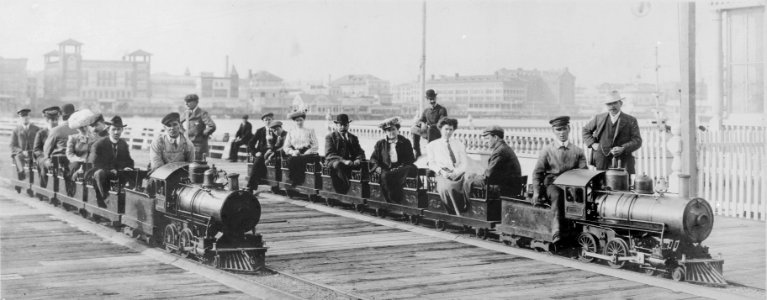 People on two miniature railroad trains on bridge or pier, possibly at Dreamland, Coney Island, New York City LCCN96510269 photo