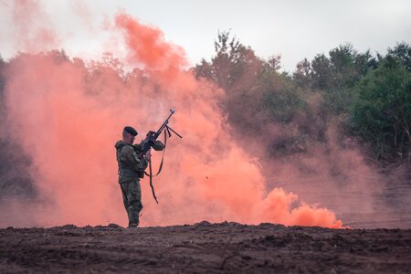 People flash machine gun
