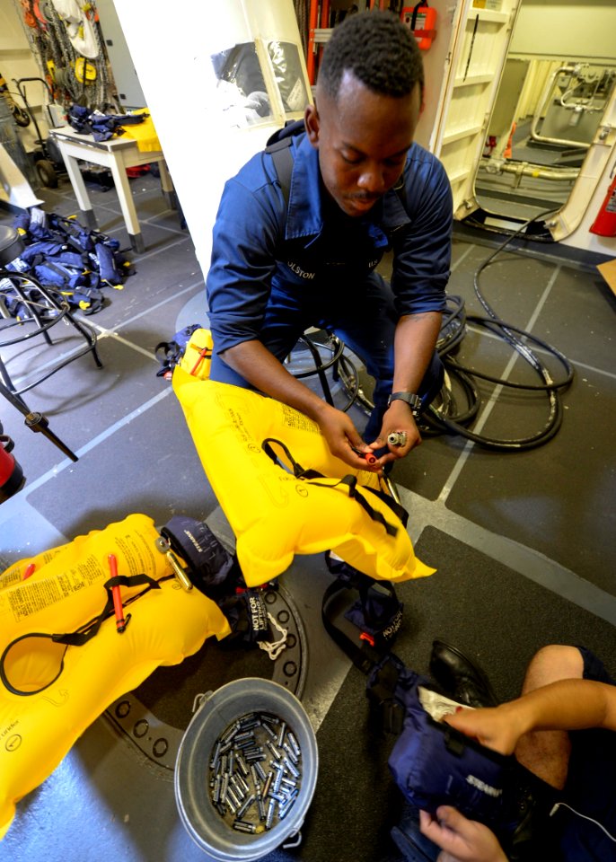Personal flotation device safety check 140615-N-IK388-011