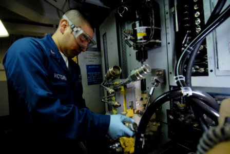 Performing maintenance 090117-N-ND508-004