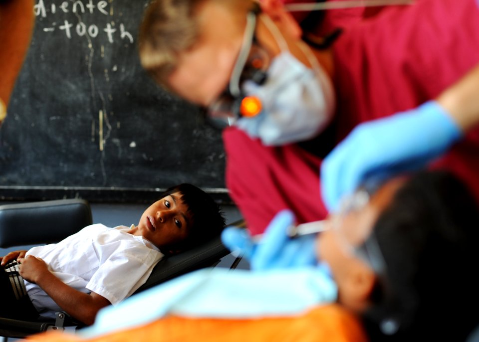 Peruvian awaits dental procedure by Navy dentist. (5690529476)