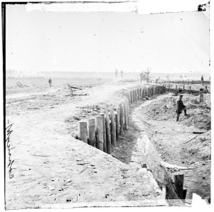 Petersburg, Virginia. Confederate breastworks in front of Petersburg. (The small mounds with chimneys are soldier's quarters under ground) LOC cwpb.02625