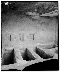 Petra (Wadi Musa) El-M'esrah area. A Nabatean tomb interior. Floor graves with a Dushara emblem at head of each LOC matpc.00249