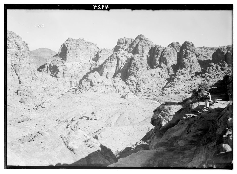 Petra (Wadi Musa). El-Habis area. The acropolis hill from high place of sacrifice, showing Qasr el-Bint and high mountain peaks across es-Siyyagh LOC matpc.03102