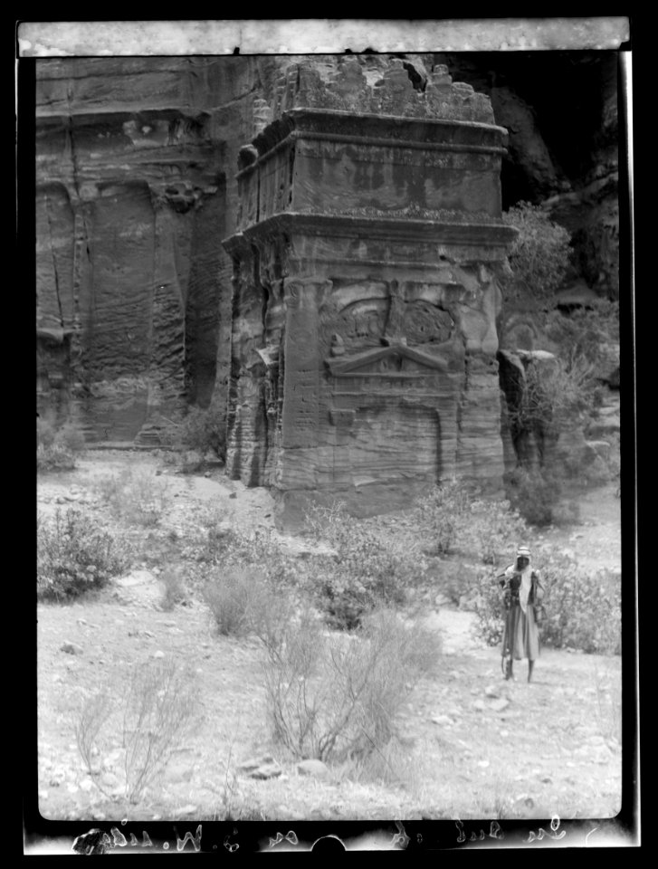 Petra. Lower Siq. Sahrij with classical decoration topped with disengaged crow-step battlements. In lower Siq LOC matpc.16268
