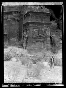 Petra. Lower Siq. Sahrij with classical decoration topped with disengaged crow-step battlements. In lower Siq LOC matpc.16268