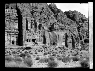 Petra. Theatre and el-Khubta area. Facade of el-Khubta range showing the large 'Corinthian' monument and smaller Nabtean tombs LOC matpc.16273