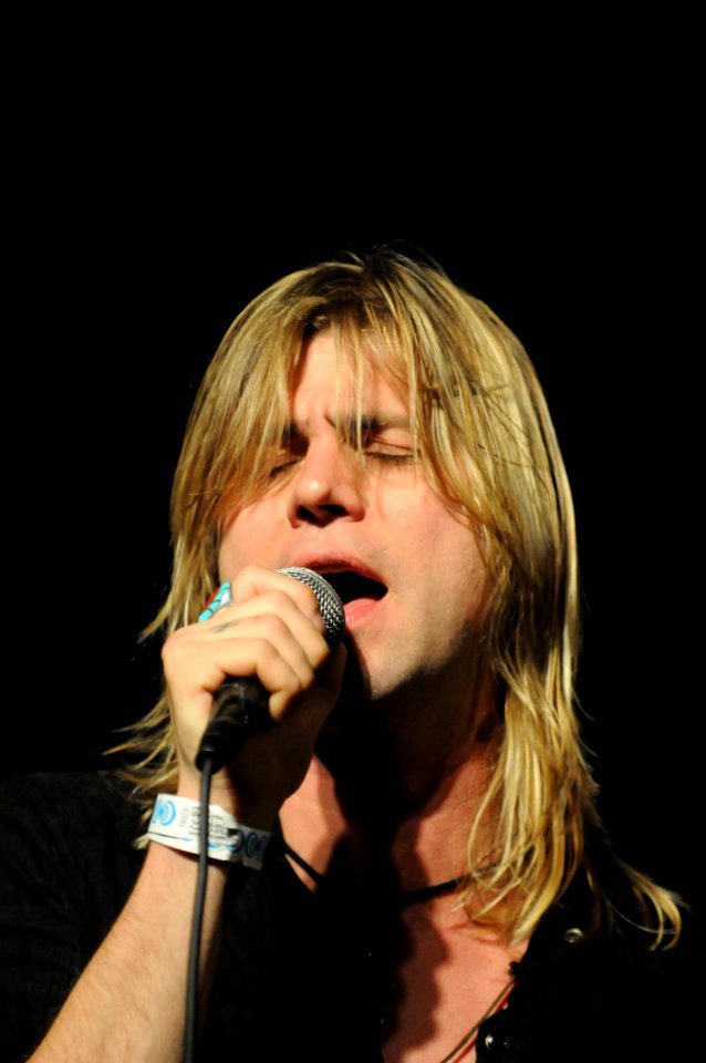 Philadelphia based Alternative rock band Fosterchild lead singer Danny Beissel sings during a New Years Eve concert in Guantanamo Bay DVIDS355354