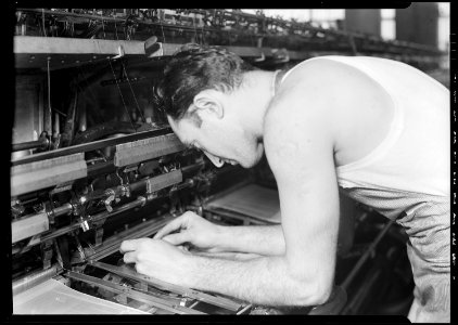 Philadelphia, Pennsylvania - Hosiery. Minnesac Mills. (Man bending over machine.) - NARA - 518689