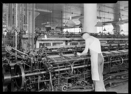 Philadelphia, Pennsylvania - Hosiery. Minnesac Mills. (Man working over long row of machines.) - NARA - 518691
