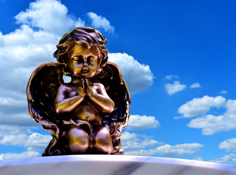 Guardian angel pray sculpture
